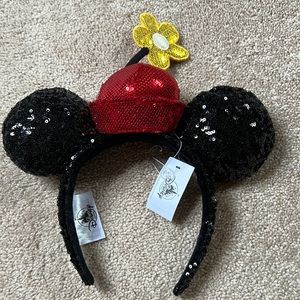 Mickey/Minnie mouse ears. Never worn. Tags attached. Brand new